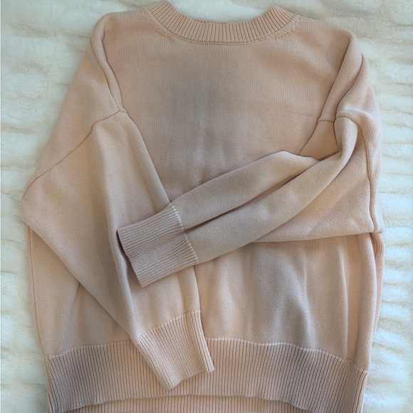 Relaxed Crewneck Sweater in Pale Peach - Picture 2 of 5